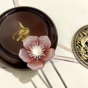 handmade silver-plated plum blossom hair fork features a wire-wrapped plum-coloured Czech crystal flower and white agate.